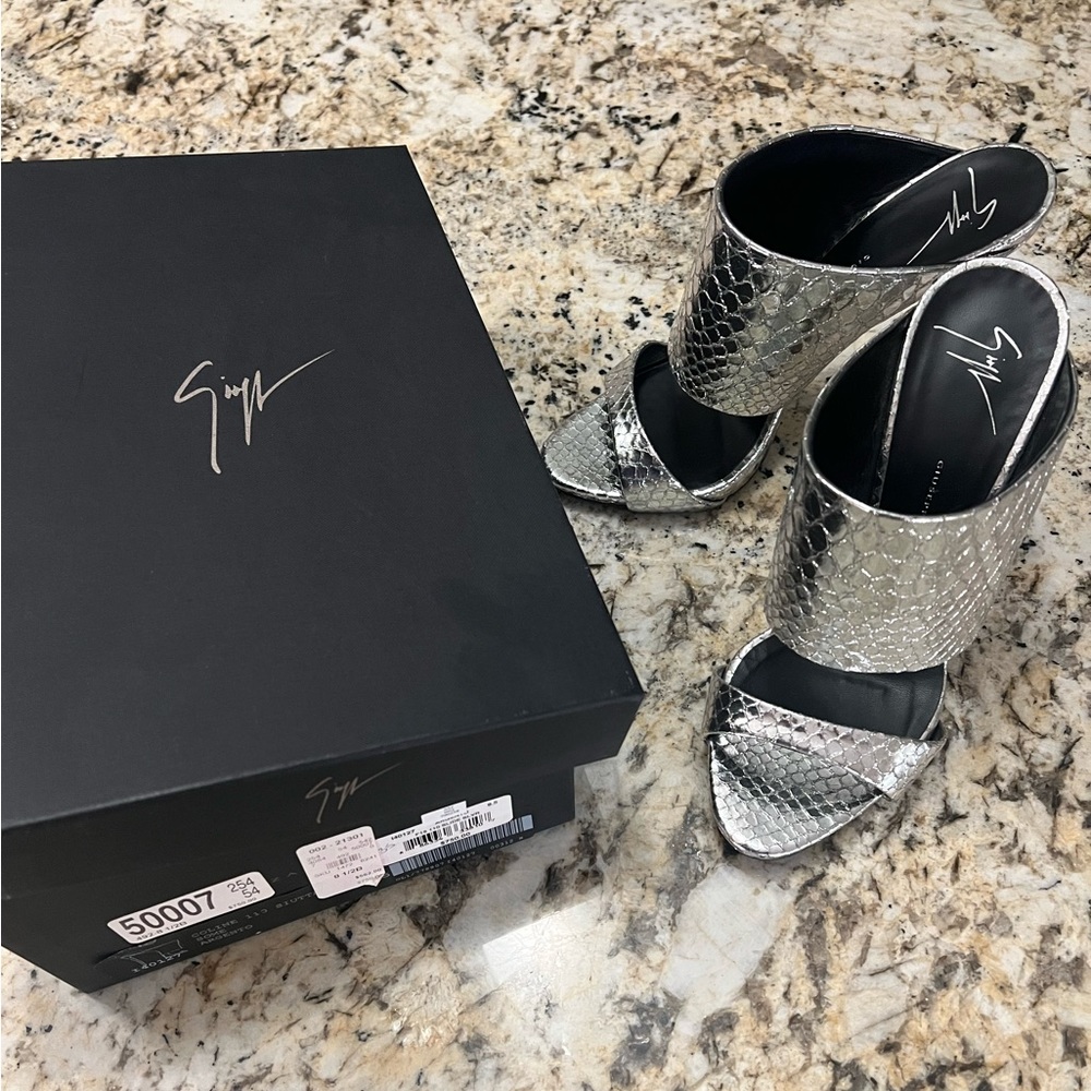 8.5 like new silver heels